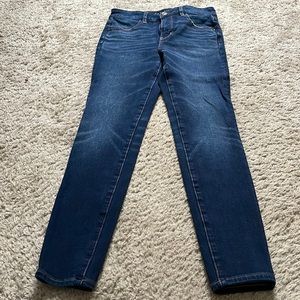 Dark wash American Eagle jeans.
